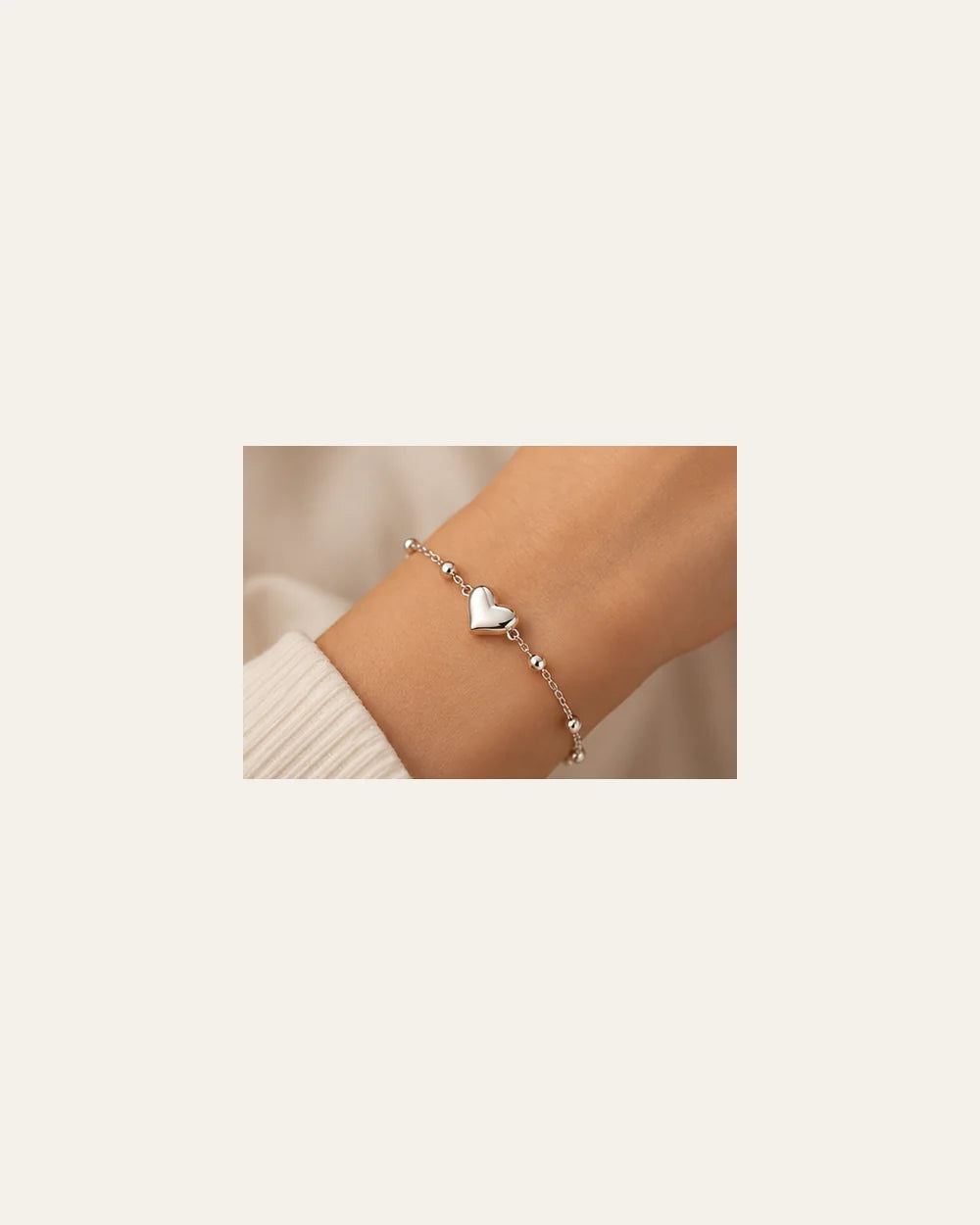 Pulseira Coração com Zircônias em Prata 925 – 18 a 22cm - escala no corpo