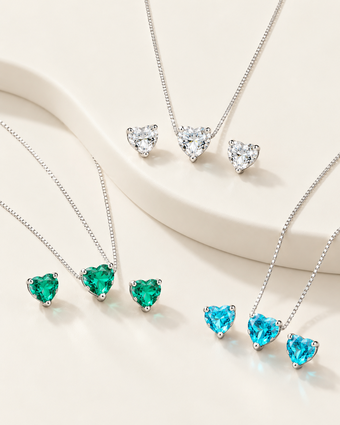 Conjunto coração com zircônia nas cores branca azul e verde